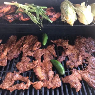 Carne Asada, Marinated Chicken almost done.
