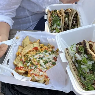 Elote fries, and a bunch of scallion pancake tacos : sesame chicken, 2x Mongolian beef, char siu pork, spicy tuna.