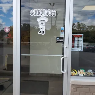 Front door. A bit hard to find. Look on the side of the parking lot!