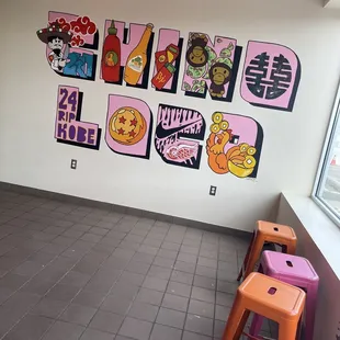 a wall with cartoon characters