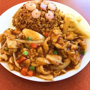 a plate of food with rice and vegetables