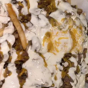 Asada fries (beans plus pico and guac not pictured)