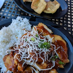 Sesame chicken. Super fresh, crispy, juicy and the sauce is sweet with a kick. Plus 3 cream cheese puffs.