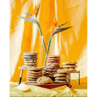 a plate of cookies and a bird of paradise flower