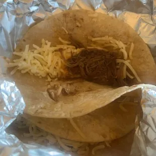 1 bite of meat and cold tortillas.