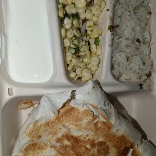 a meal in a styrofoam container
