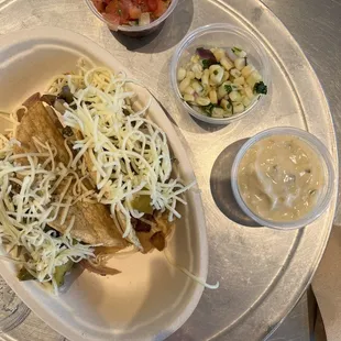 Happy with  two chicken tacos with the sides fills me up! Good! For 20-30 minutes anyway. Off to Whole Foods!