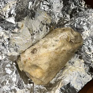 Photo evidence of the disgustingly wrapped, sour cream-smeared burrito. Do better!!