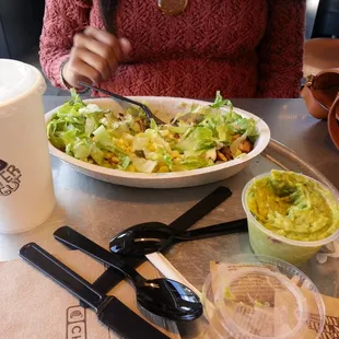 Burrito bowl with guacamole on the side