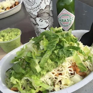 Burrito Bowl Fillings: White Rice, Fajita Veggies, Chicken, Roasted Chili-Corn Salsa, Sour Cream, Cheese, Romaine Lettuce &amp; Some Guacamole!