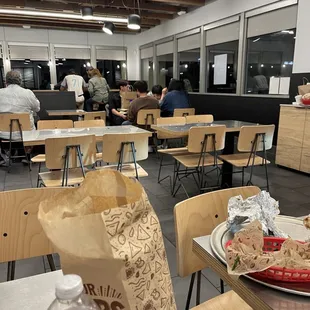 All of the tables covered in crumbs, every single one.