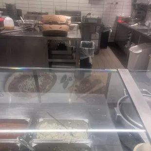 Dirty box sitting on food prep station. Dirty avocados used to make guacamole.