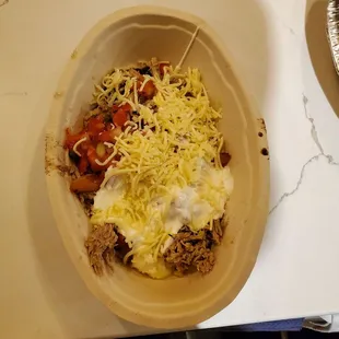 Chicken Burrito Bowl. Looks about 1/2 size.