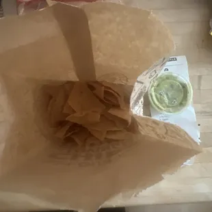 8$ large chips and guacamole untouched