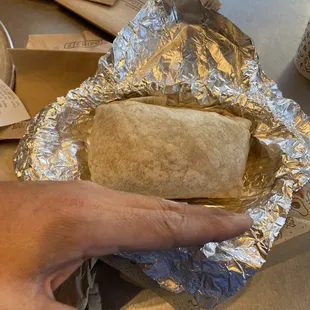 a burrito wrapped in foil