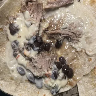 A sad taco missing meat