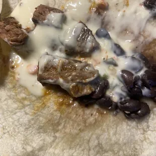 A sad taco missing meat