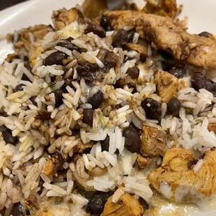 RAW rice with chicken and beans.