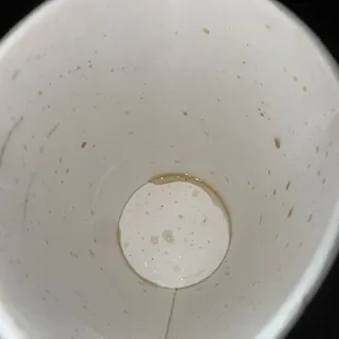 black specs/dots/things &amp; a bunch more went down the sink.  i was dumping the rest before throwing the cup away at home and saw these