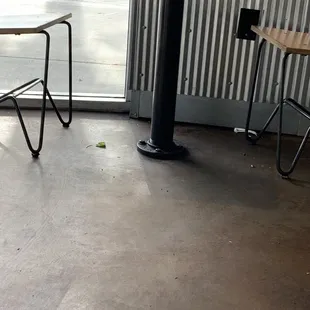 Across from me food and trash