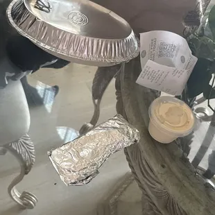 bowl with tortilla and queso on side