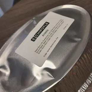 a business card on a pan