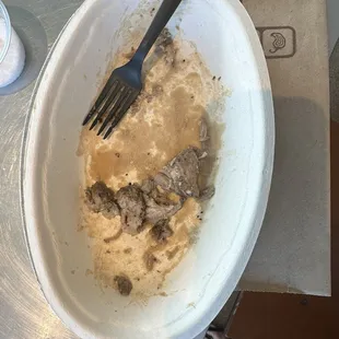 The fat that made up  of my portion of carnitas.