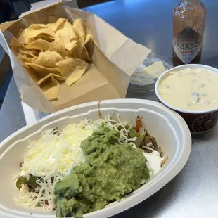 Carnitas Burrito Bowl, chips and queso