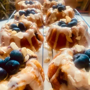 blueberries and almonds on top of donuts