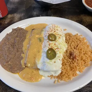 Soft cheese taco and sour cream chicken enchilada