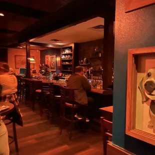 people sitting at the bar