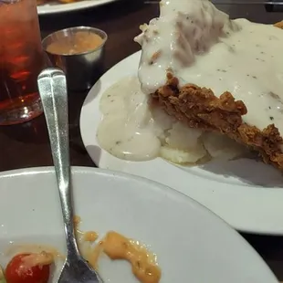 Chicken fried Steak with mashed potatoes.  Fries with gravy