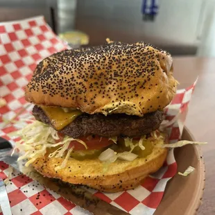 1/2 lb burger with cheddar cheese and guacamole.