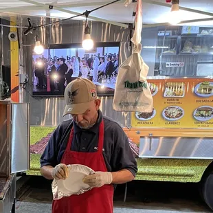 The guy who makes the al pastor tacos.