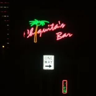 the neon sign for one way