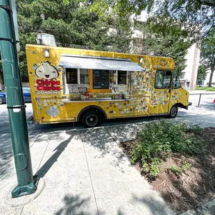 a yellow food truck