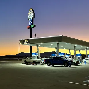 a gas station at dusk