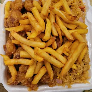 Orange chicken with pork fried rice and fries