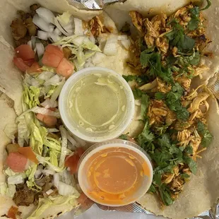 2 ground beef tacos(no onions), 2 pollo tacos (no sour cream)