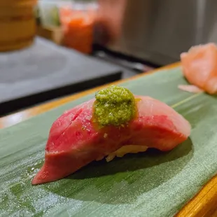 Yellowtail with pesto caviar nigiri sushi