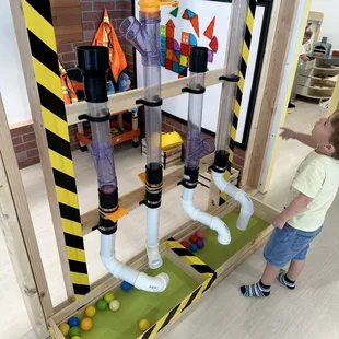 a child playing with a construction set