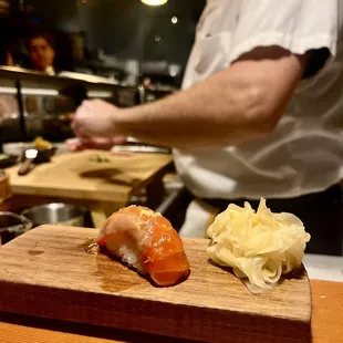 a chef preparing sushi