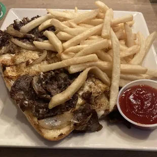 Cheesesteak and fries