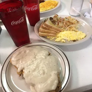 Chicken fried steak breafast with toast, hash browns and eggs your way (mine is scrambled)