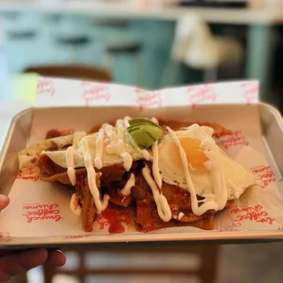 Chilaquiles with chorizo, and red sauce.