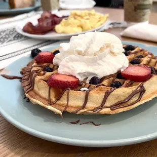 Waffles w/ eggs and bacon