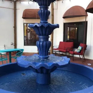 The blue fountain you see when you enter in the patio area.