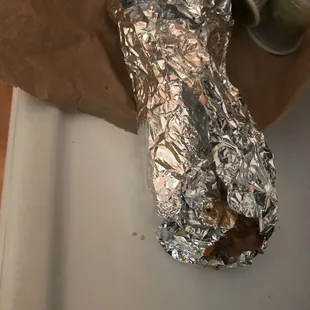 Opened taco by a customer and restaurant owner passed it off to another customer.