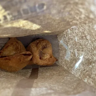 Vegetable samosa. Little spicy. Crisp and a great price.