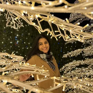 Sneha M.